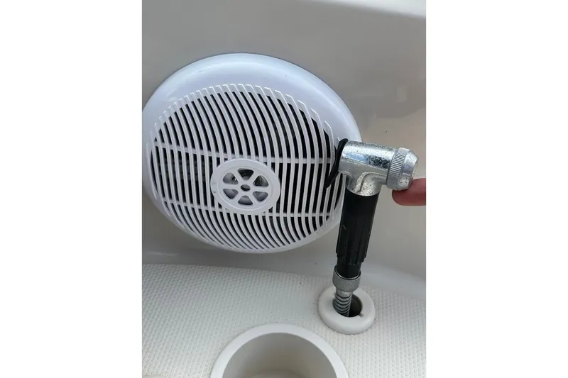 Slide: The Image of Close-up of a 2004 Sea Ray 270 Sundeck speaker and hose connection. - 41