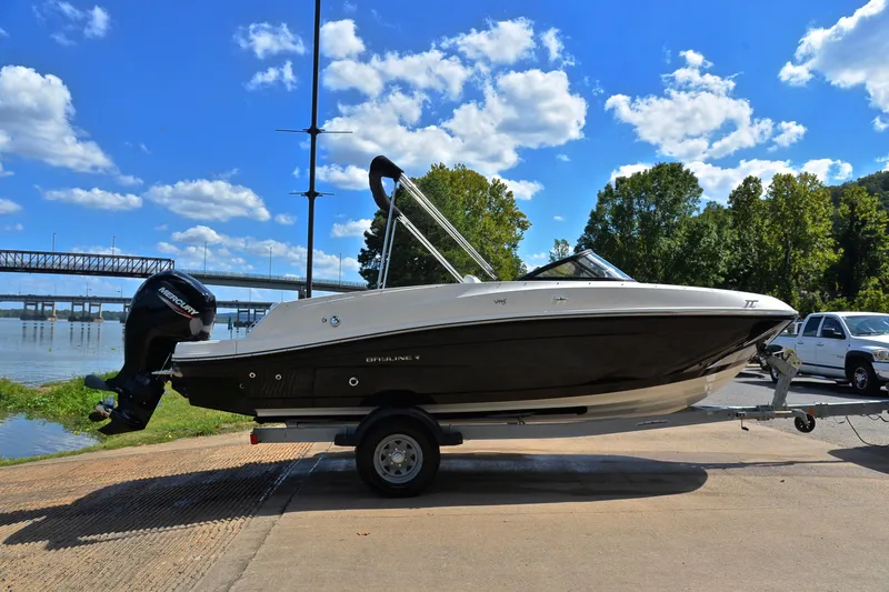 Slide: The Image of 2018 Bayliner VR5 Bowrider OB on trailer by a scenic river. - 15