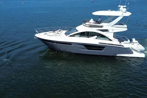 Slide: The Image of 2018 Cruisers Cantius yacht cruising on open water. - 0