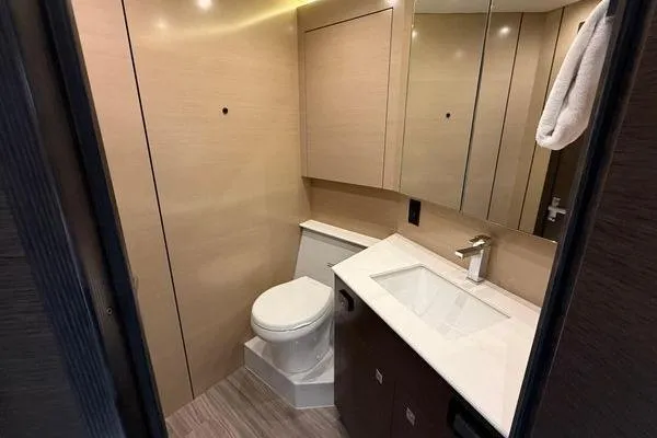 Slide: The Image of Luxurious bathroom in 2018 Cruisers Cantius yacht with modern fixtures and sleek design. - 15