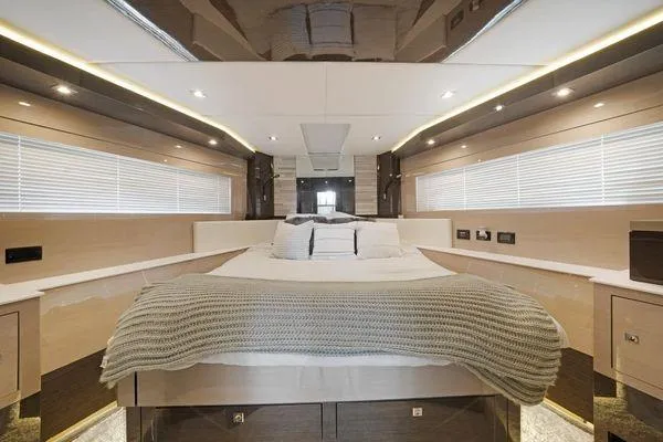Slide: The Image of Luxurious 2018 Cruisers Cantius yacht bedroom with modern design and ambient lighting. - 16