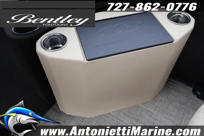 Slide: The Image of 2026 Bentley Pontoons Fish 243 Swingback interior detail with contact information and logo. - 12