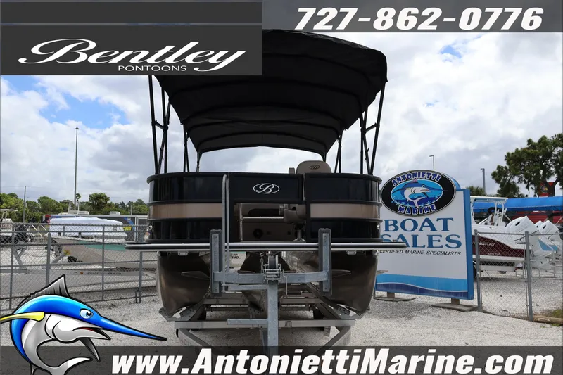 Slide: The Image of 2026 Bentley Pontoons Fish 243 Swingback displayed at Antonietti Marine dealership. - 3