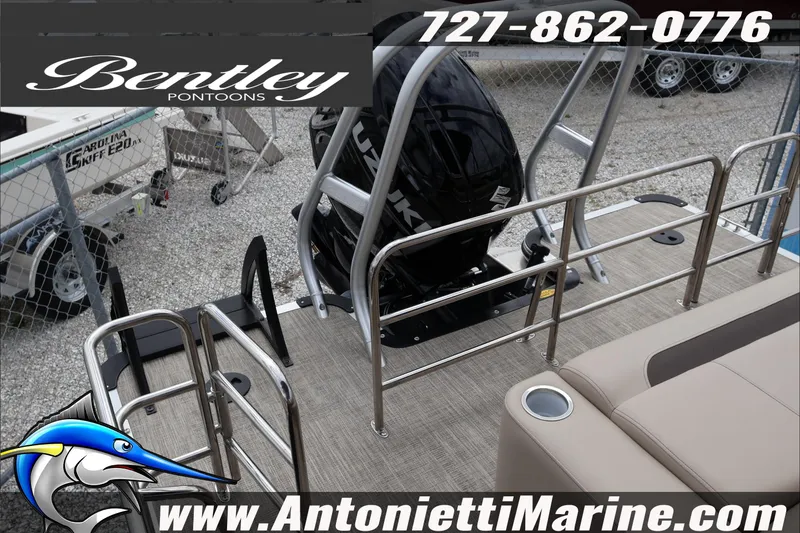 Slide: The Image of 2026 Bentley Pontoons Fish 243 Swingback interior with beige seating and modern controls. - 32