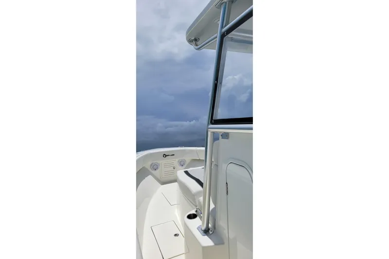 Slide: The Image of Captain's seat on 2021 Sea-Lion 27 CC boat at marina. - 10