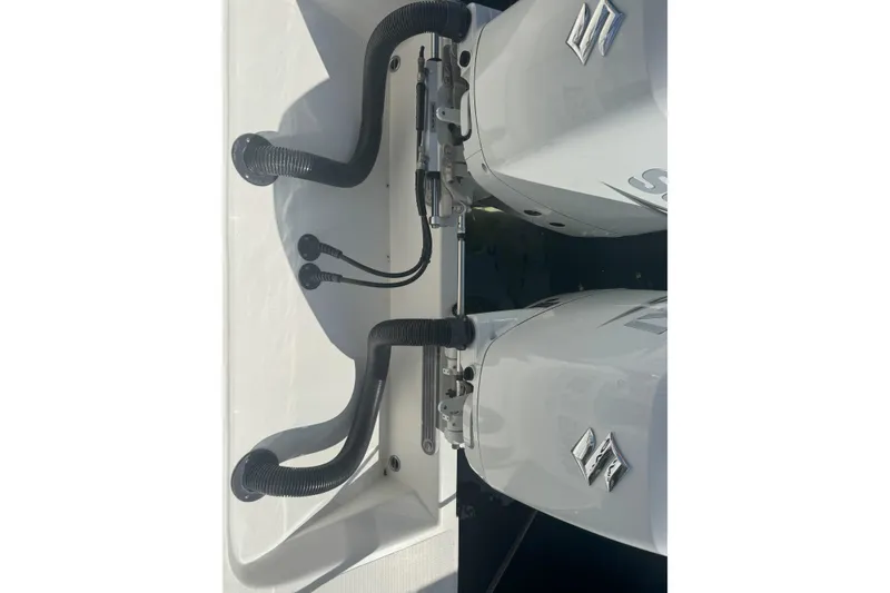 Slide: The Image of Garmin radar on 2021 Sea-Lion 27 CC boat, docked under clear blue sky. - 14