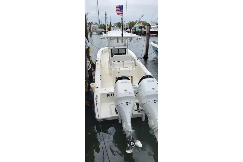 Slide: The Image of 2021 Sea-Lion 27 CC boat interior with seating and storage compartments. - 8