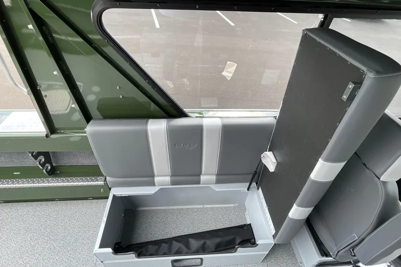 Slide: The Image of 2026 Hewescraft 210 Sea Runner ET HT interior seating, featuring gray upholstery and modern design. - 14