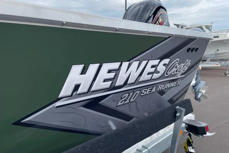 Slide: The Image of Control panel of 2026 Hewescraft 210 Sea Runner ET HT with fishbox and livewell switches. - 26