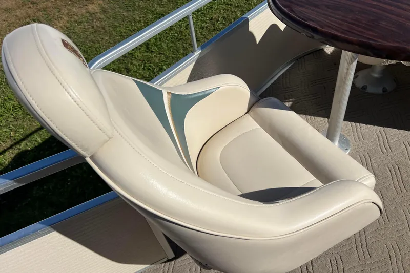 Slide: The Image of Luxurious seating on 2002 Premier 225 Majestic boat with elegant design and comfortable upholstery. - 31