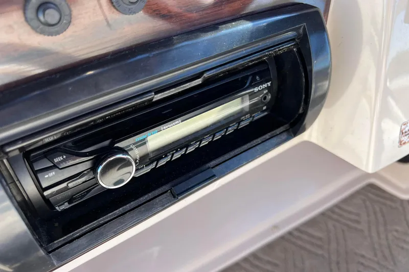 Slide: The Image of Sony marine stereo system in a 2002 Premier 225 Majestic boat dashboard. - 38