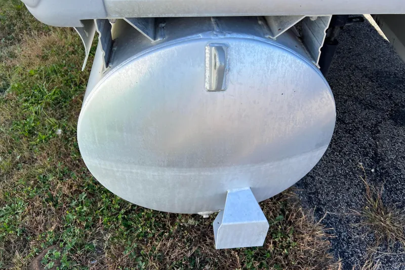Slide: The Image of Close-up of a 2002 Premier 225 Majestic pontoon boat's aluminum fuel tank. - 6