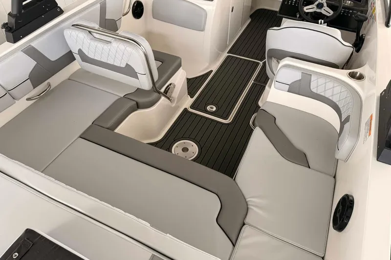 Slide: The Image of 2026 Bayliner VR6 Bowrider OB interior with sleek seating and modern design. - 3