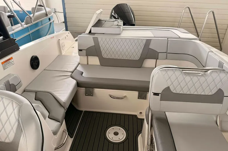 Slide: The Image of 2026 Bayliner VR6 Bowrider OB interior with gray seating and modern design. - 4