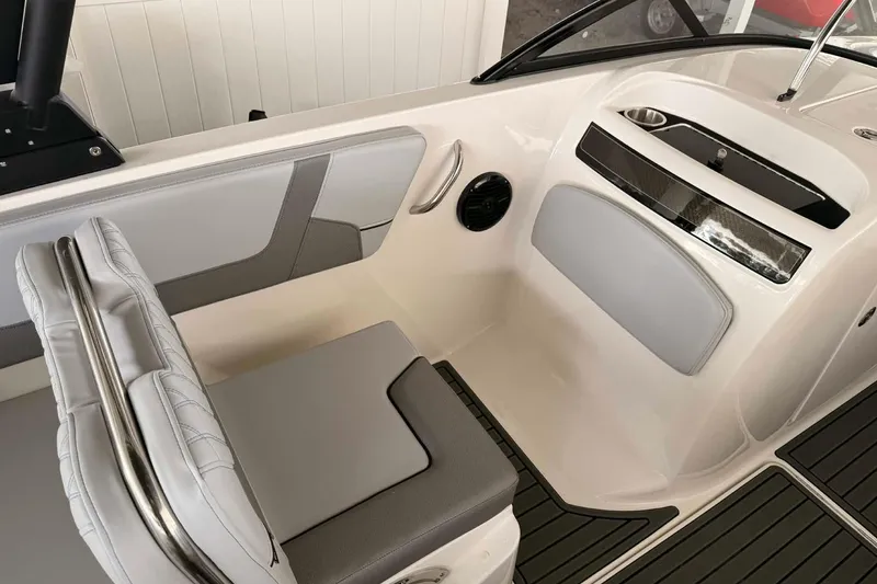 Slide: The Image of 2026 Bayliner VR6 Bowrider OB interior with sleek seating and modern design. - 8