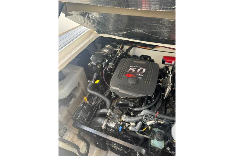 Slide: The Image of Engine compartment of 2005 Sea Ray 280 Sundancer with MerCruiser 5.0 MPI engine. - 33