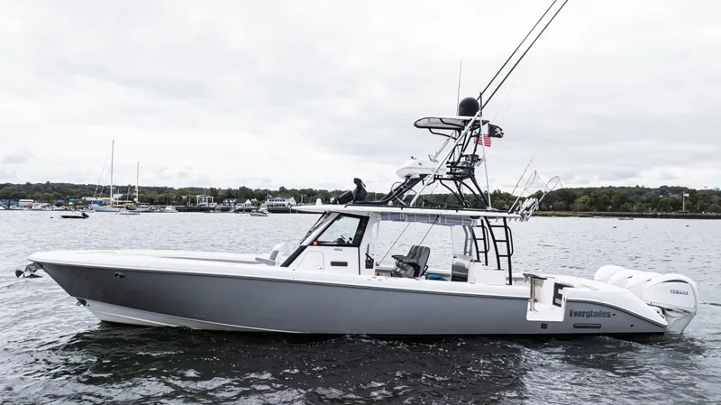 The Image of 2017 Everglades 435 CC boat on water, featuring sleek design and powerful engines. - 0