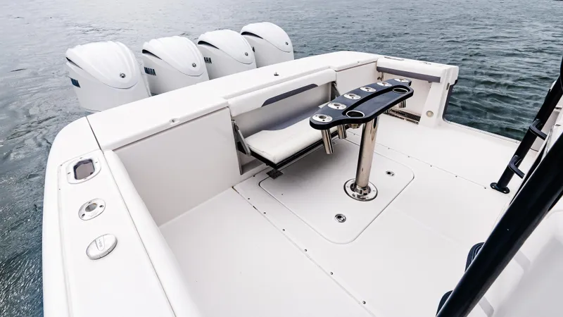 Slide: The Image of 2017 Everglades 435 CC boat deck with four engines and fishing station. - 16