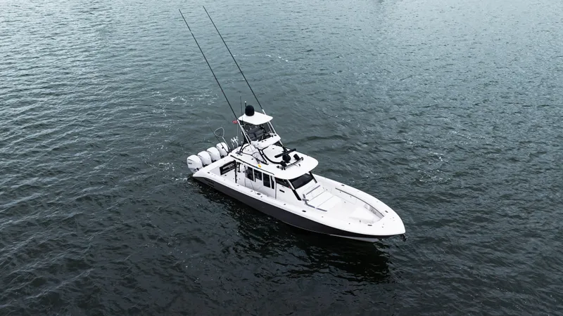 Slide: The Image of 2017 Everglades 435 CC boat on open water, aerial view. - 7