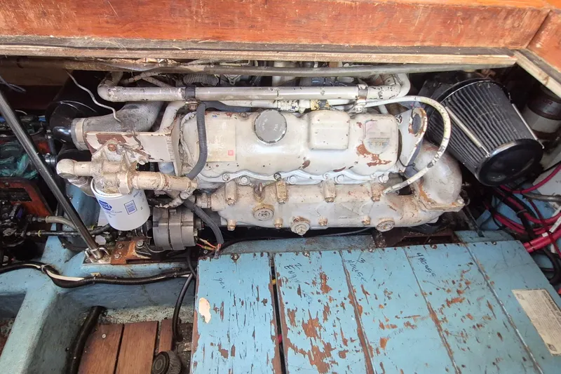 Slide: The Image of Engine compartment of a 1990 Sabreline 36 Fast Trawler with visible components. - 85