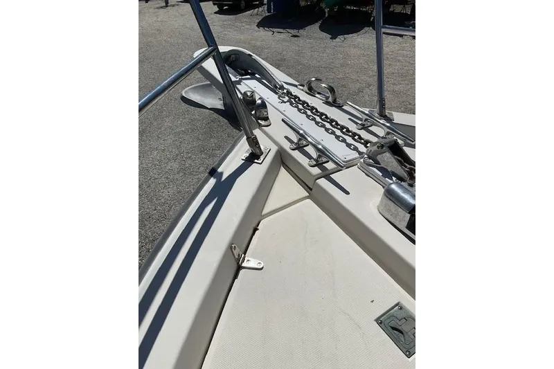 Slide: The Image of Bow of 1990 Sabreline 36 Fast Trawler with anchor and chain detail. - 54