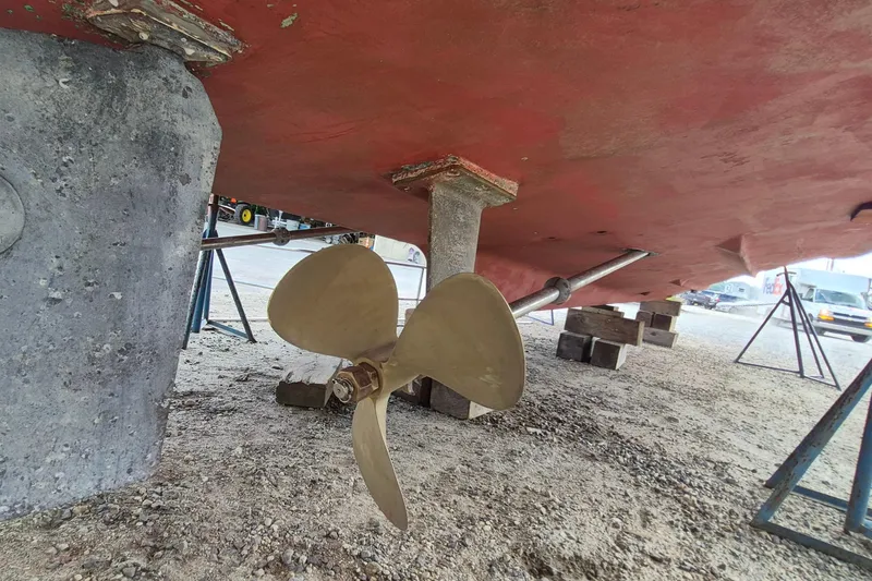 Slide: The Image of 1990 Sabreline 36 Fast Trawler propeller and hull on dry dock. - 89