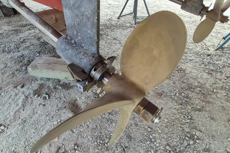 Slide: The Image of Propeller of 1990 Sabreline 36 Fast Trawler on dry dock, showcasing marine engineering. - 91