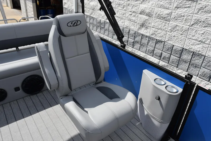 Slide: The Image of 2026 Bentley Pontoons Legacy 243 Swingback interior with luxurious seating and cup holders. - 10