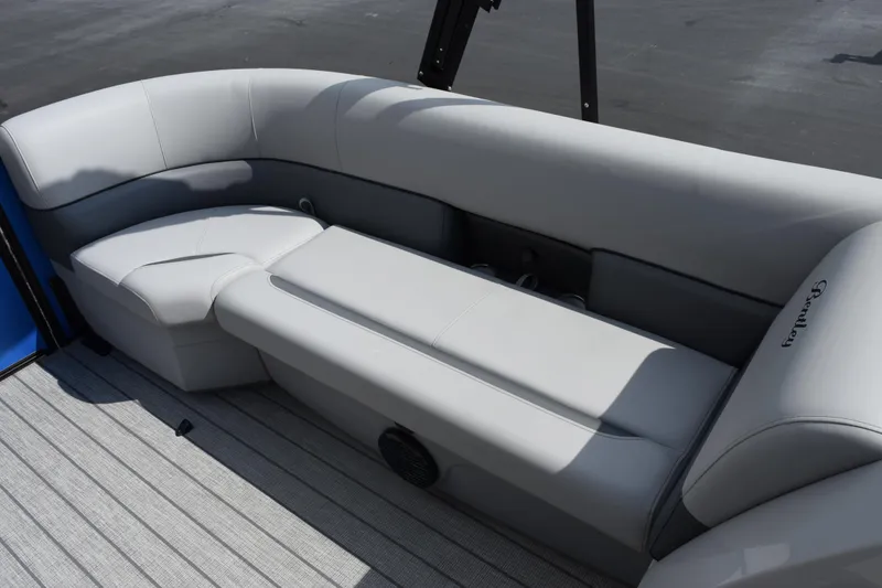 Slide: The Image of 2026 Bentley Pontoons Legacy 243 Swingback interior seating, featuring luxurious gray upholstery. - 13