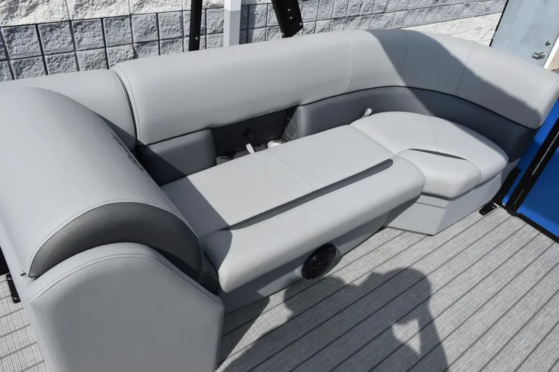 Slide: The Image of 2026 Bentley Pontoons Legacy 243 Swingback interior seating, featuring sleek gray upholstery. - 14