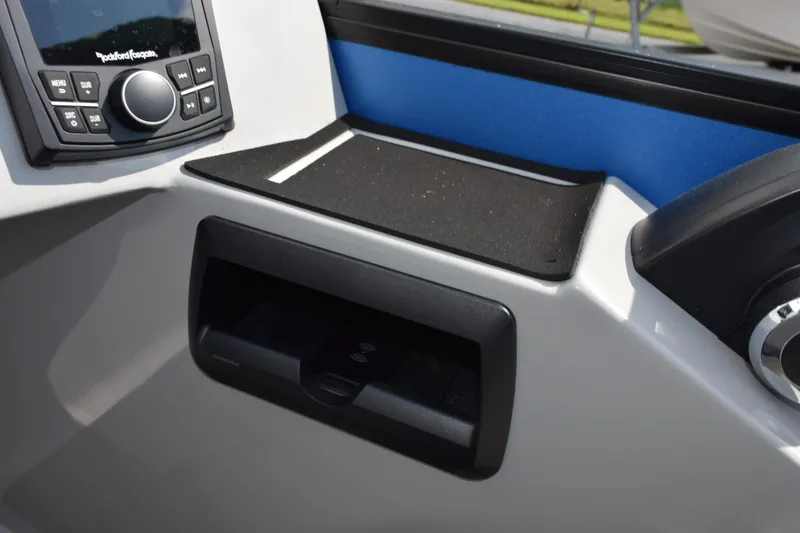 Slide: The Image of Dashboard of 2026 Bentley Pontoons Legacy 243 Swingback with audio controls. - 18