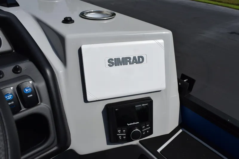 Slide: The Image of Control panel of 2026 Bentley Pontoons Legacy 243 Swingback with Simrad display. - 19