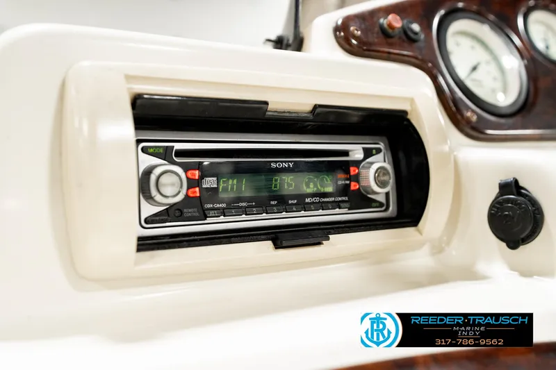 Slide: The Image of Control panel of a 2003 Bennington 2050 RL boat with various switches. - 34