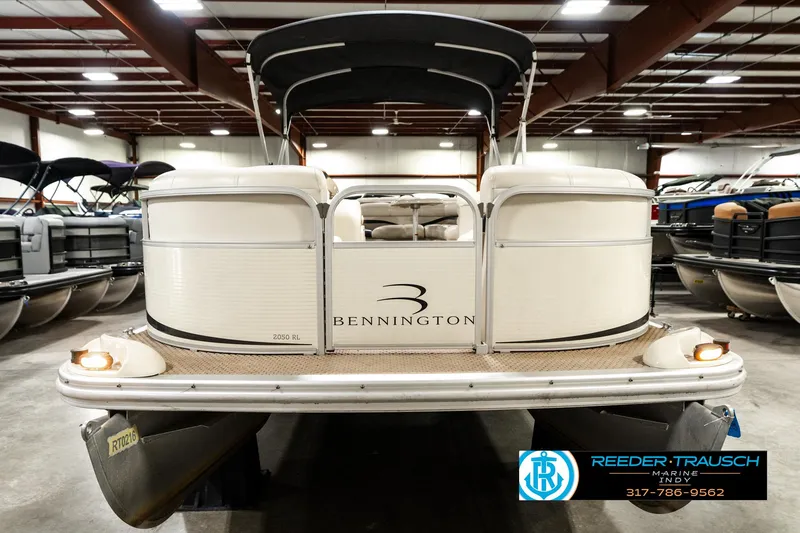 Slide: The Image of 2003 Bennington 2050 RL pontoon boat in indoor showroom, front view. - 5