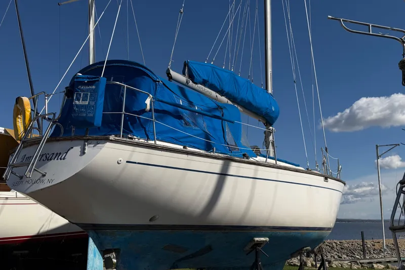 Slide: The Image of 1982 Morgan 383 sailboat with blue cover, docked at Sleepy Hollow, NY. - 21