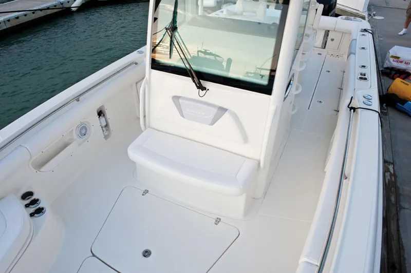 Slide: The Image of 2015 Boston Whaler 320 Outrage boat interior, docked at marina. - 34
