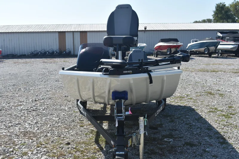 Slide: The Image of 2026 Lowe Skorpion 17 boat on trailer, outdoor display, sunny day. - 3