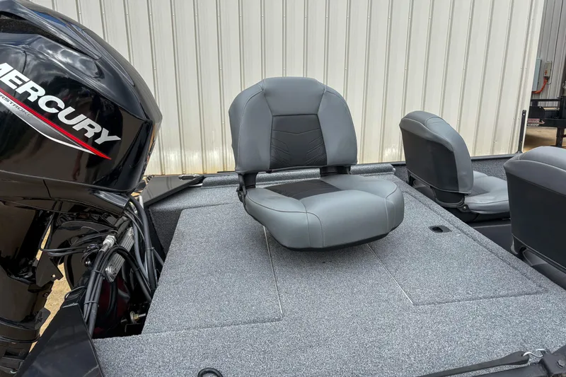 Slide: The Image of 2024 Bass Tracker Classic XL boat with Mercury engine and gray seating. - 10