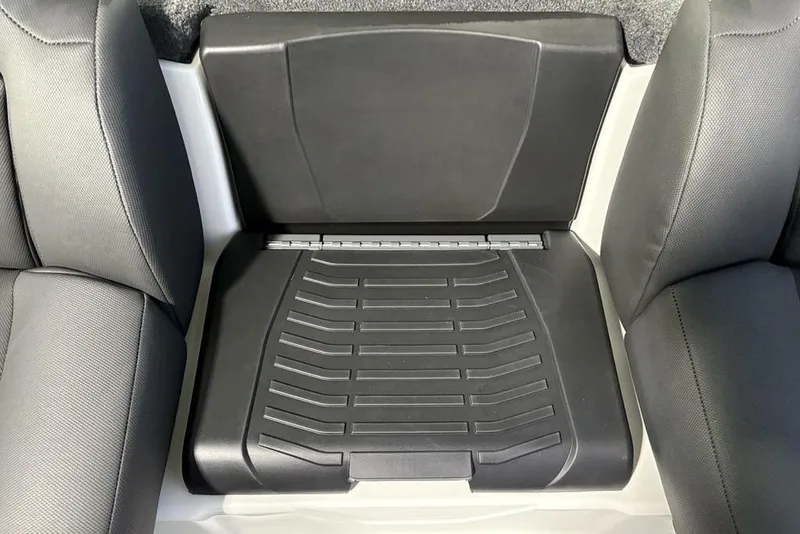 Slide: The Image of 2026 Skeeter ZXR19 SE boat seat with black textured design. - 17