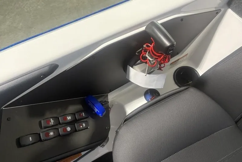 Slide: The Image of Interior of 2026 Skeeter ZXR19 SE boat showing control panel and seating. - 20