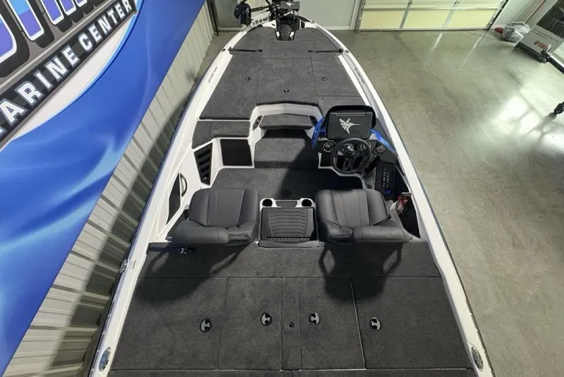 Slide: The Image of 2026 Skeeter ZXR19 SE boat interior with dual seats and control panel. - 32
