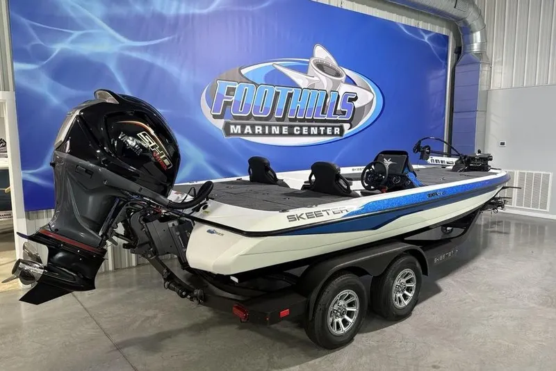 Slide: The Image of 2026 Skeeter ZXR19 SE boat displayed at Foothills Marine Center showroom. - 4