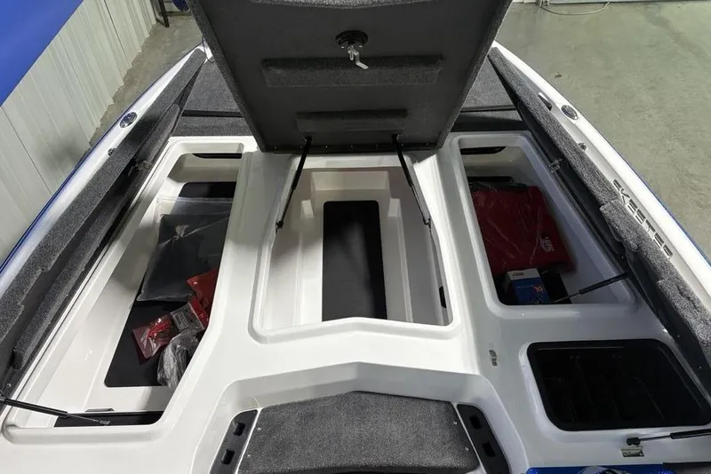 Slide: The Image of Open storage compartments of 2026 Skeeter ZXR19 SE boat, showcasing interior space. - 5