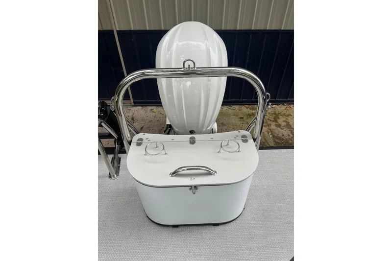 Slide: The Image of 2026 Tahoe 23 LTZ Quad Lounger boat with sleek design and modern features. - 3