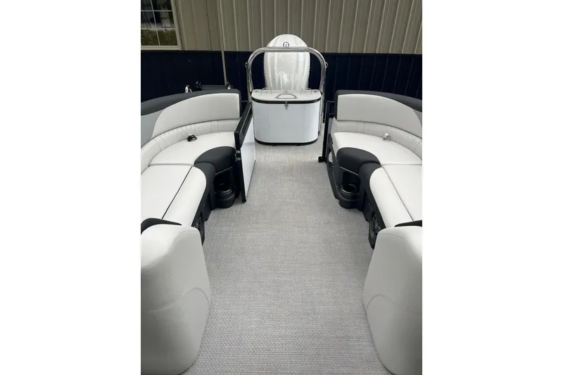 Slide: The Image of 2026 Tahoe 23 LTZ Quad Lounger interior with sleek white seating and modern design. - 4