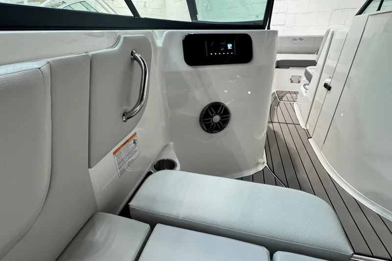 Slide: The Image of Manufacturer Provided Image: 2025 Sea Ray SDX 250 Outboard interior with luxurious seating and modern design. - 11