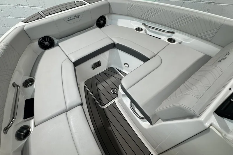 Slide: The Image of 2025 Sea Ray SDX 250 Outboard helm with modern controls and sleek design. - 14