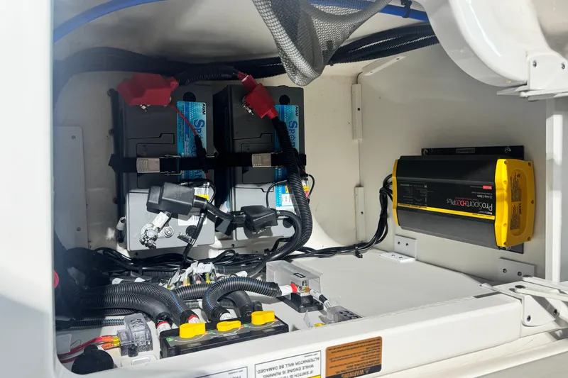 Slide: The Image of 2025 Sea Ray SDX 250 Outboard boat interior with luxurious seating and modern design. - 17