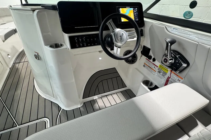 Slide: The Image of Manufacturer Provided Image: 2025 Sea Ray SDX 250 Outboard cruising on water with passengers enjoying the ride. - 8