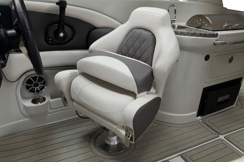 Slide: The Image of Luxurious interior of 2026 Crownline Eclipse E275 boat with plush seating and modern controls. - 4